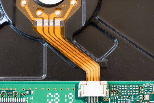 Rigid-flex cable assembly with polyimide flex circuit connecting rigid PCB sections